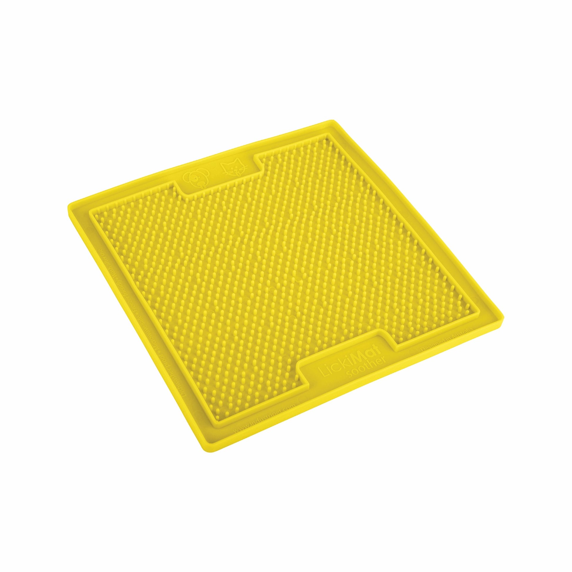 Yellow LickiMat® Classic Soother™ – Original Slow Feeder Lick Mat for Dogs (side) on a white background