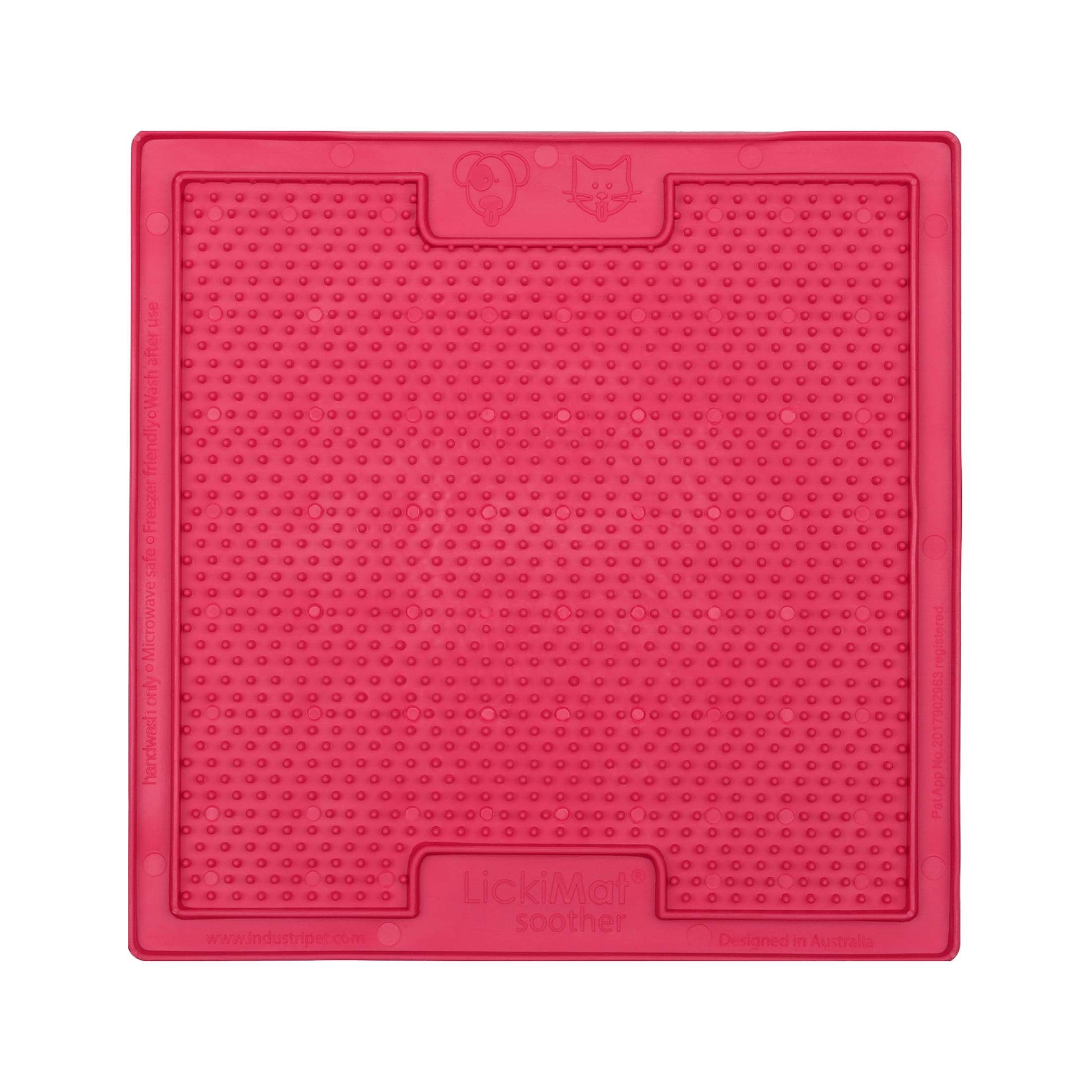 Pink LickiMat® Classic Soother™ – Original Slow Feeder Lick Mat for Dogs (front) on a white background