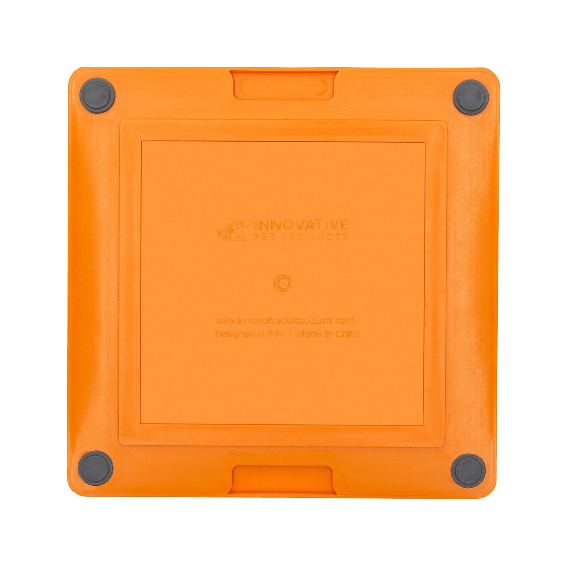 Orange LickiMat® Tuff Playdate™ – Durable Slow Feeder Lick Mat for Dogs (rear) on a white background
