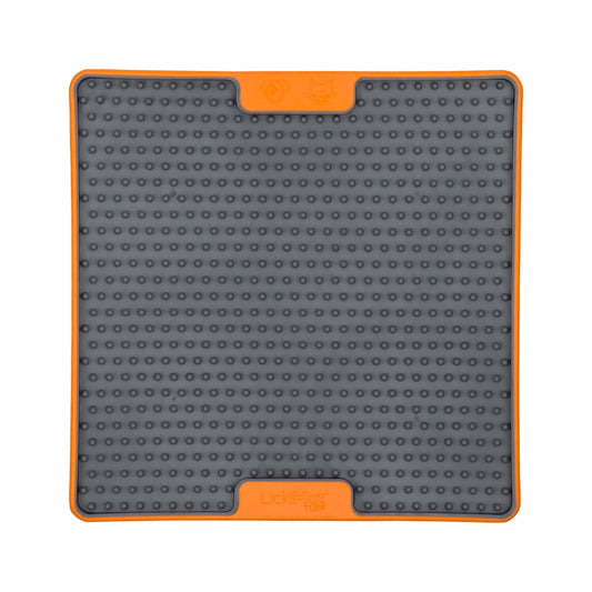 Orange LickiMat® Tuff Soother™ – Durable Slow Feeder Lick Mat for Dogs (front) on a white background