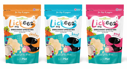 Three packages of Lickeez dog enrichment spread mix in different flavors on a white background.