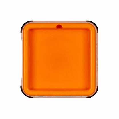 Orange LickiMat® Mini Keeper™ – Non-Slip Holder & dog bowl for LickiMats® (front) on white background