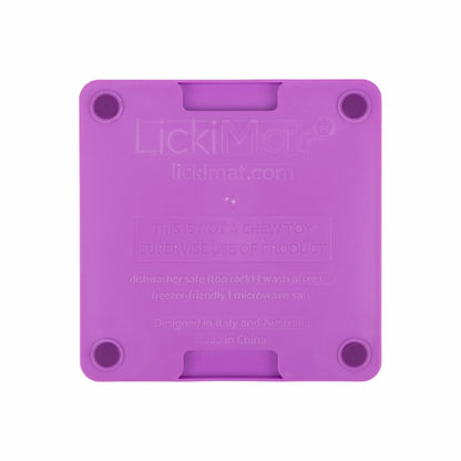 Purple LickiMat® Mini Tuff Soother™– Slow Feeder Lick Mat for Small Dogs (rear) on white background