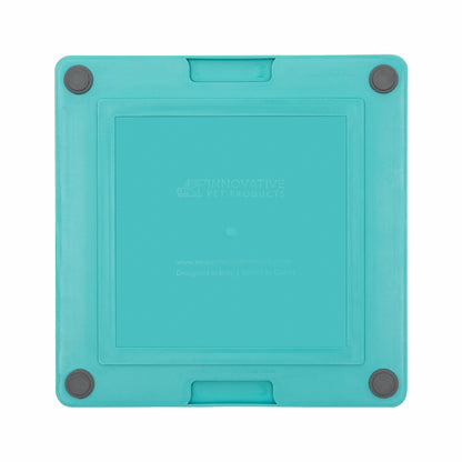 Turquoise LickiMat® Tuff Playdate™ for Cats – Durable Slow Feeder Lick Mat on white background (rear view)