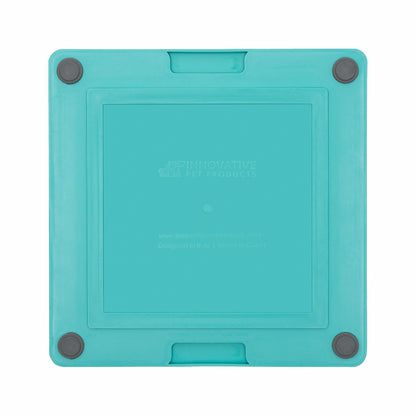 Turquoise LickiMat® Tuff Buddy™ – Durable Slow Feeder Lick Mat for Dogs (rear) on a white background