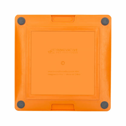 Orange LickiMat® Tuff Buddy™ – Durable Slow Feeder Lick Mat for Dogs (rear) on a white background