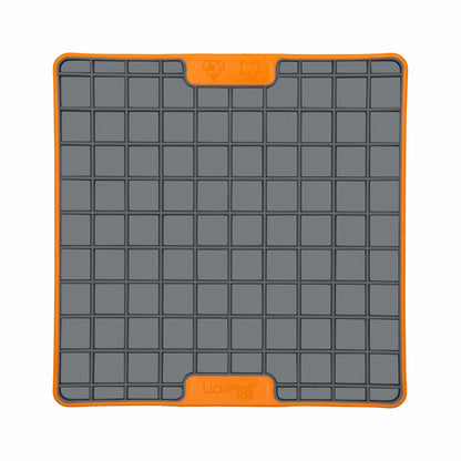Orange LickiMat® Tuff Playdate™ – Durable Slow Feeder Lick Mat for Dogs (front) on a white background
