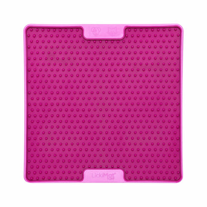 Pink LickiMat® Tuff Pro Soother™ – Slow Feeder Lick Mat for Dogs (front) on a white background