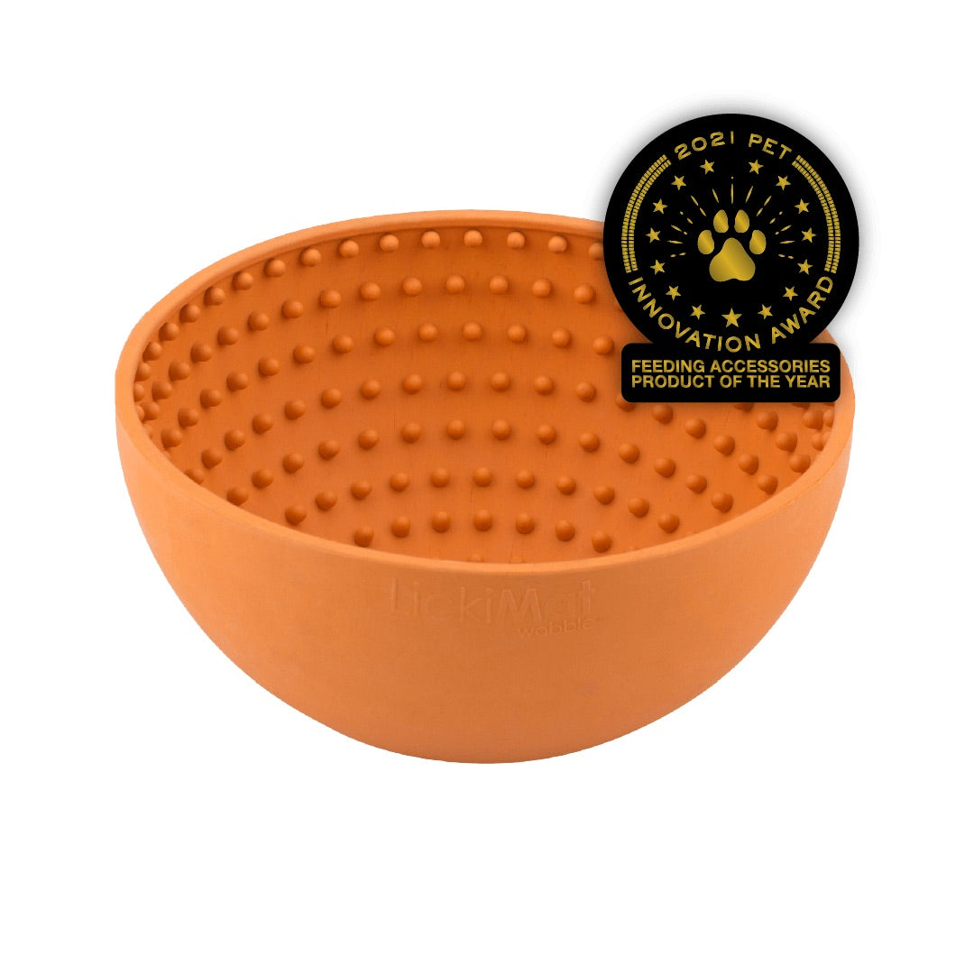Orange LickiMat® Wobble™ – Fun, Reversible Slow Feeder Bowl for Dogs (front) on a white background
